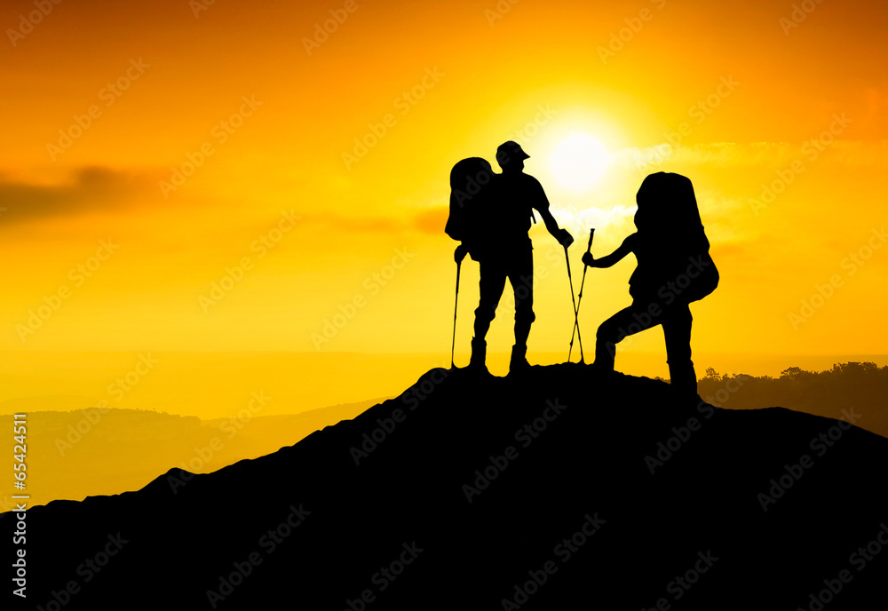 Obraz premium Tourist team on peak. Sport and active life concept