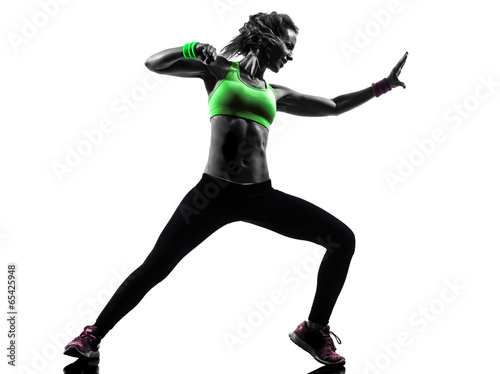 woman exercising fitness zumba dancing silhouette #65425948