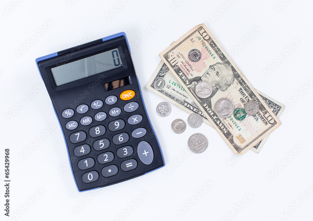 Calculator and dollar money on white background Calculator and dollar money on white background