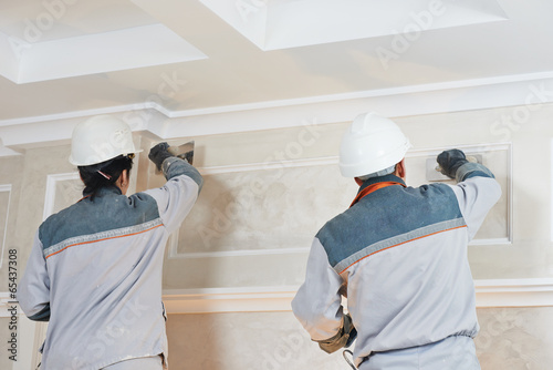 Fotografie Plasterer at indoor wall work