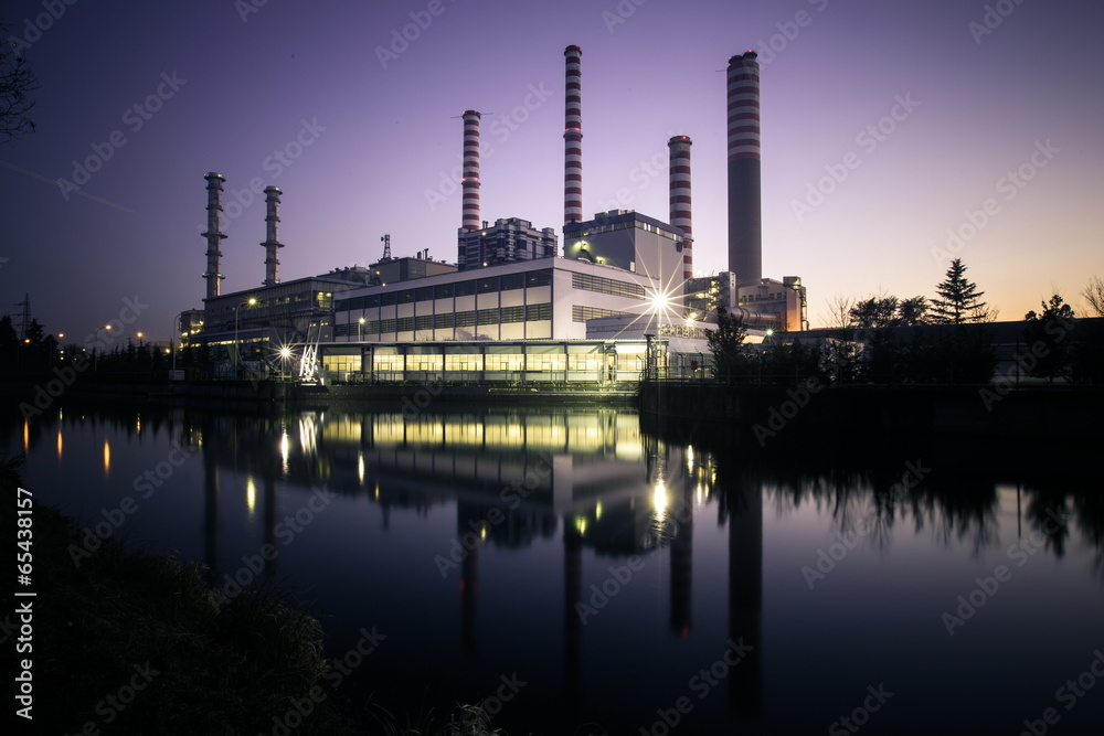 Naklejka premium Electricity power plant near a river