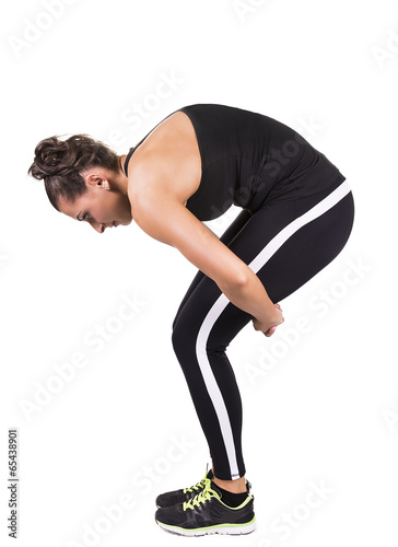 Photo of a beautiful female stretching series . 