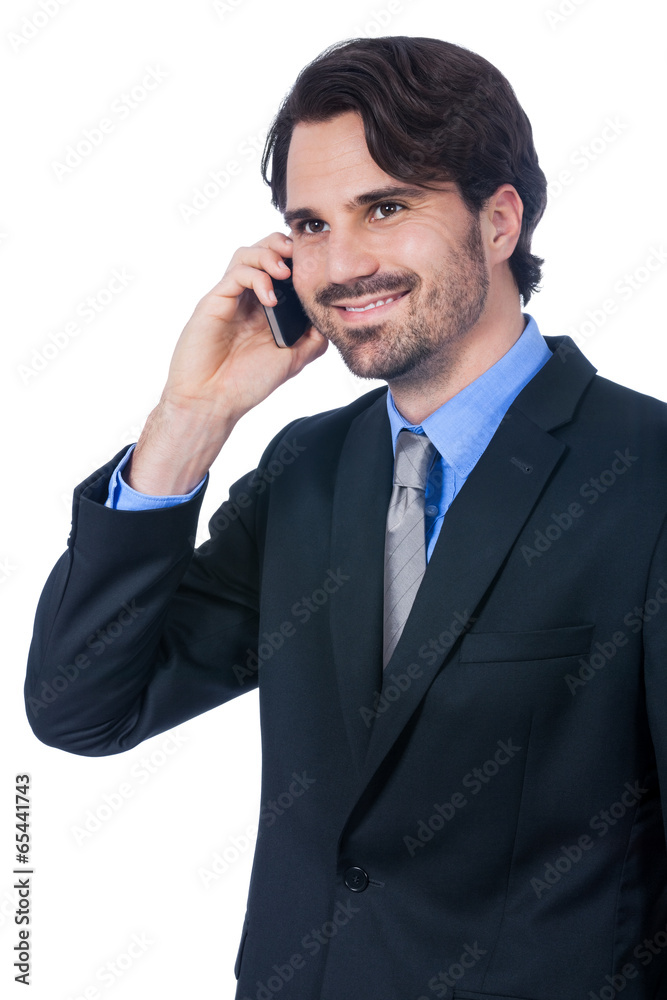 Stylish businessman talking on his mobile phone Stylish businessman talking on his mobile phone