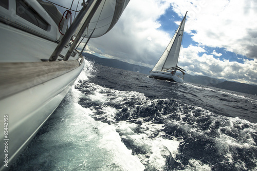 Sailing ship yachts in the sea at race in stormy weather. © De Visu