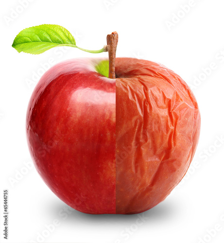 Fotografie Rotten and fresh apple isolated