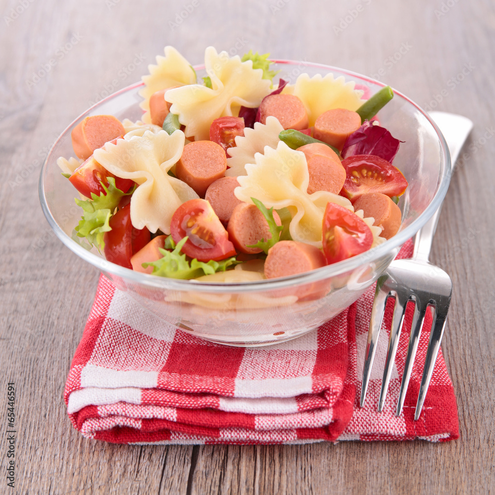 pasta salad and small sausages