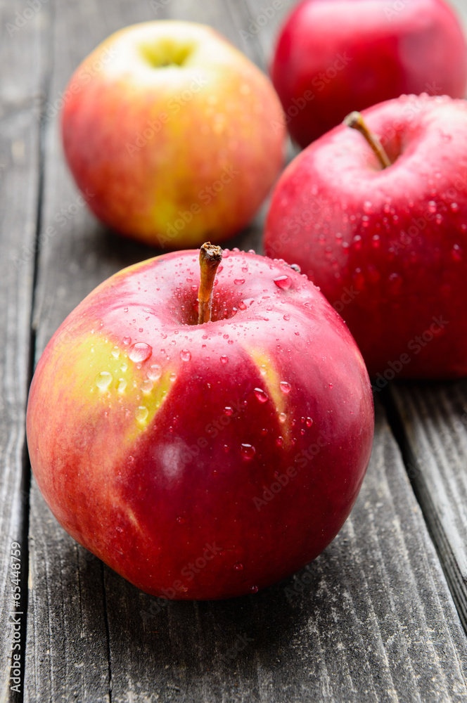 Apples on wooden table