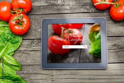 Obraz na płótnie Cooking recipes on tablet pc w salonie