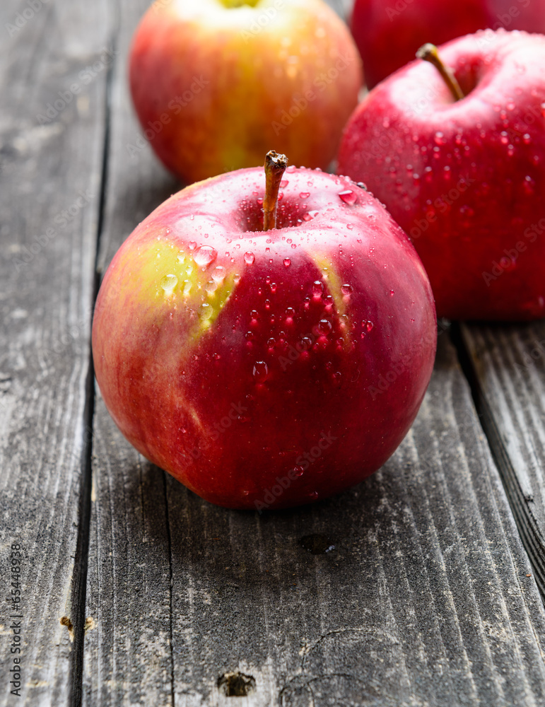 Apples on wooden table