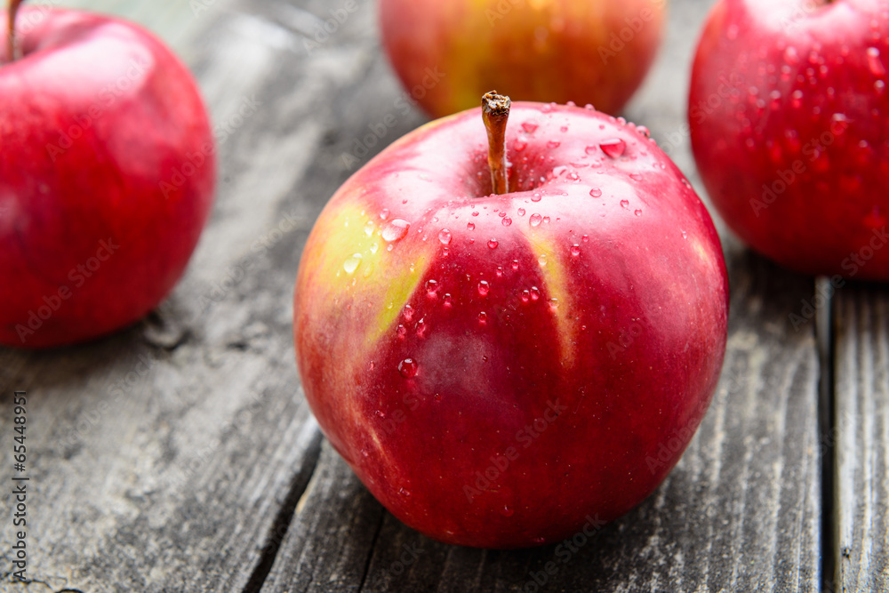 Apples on wooden table