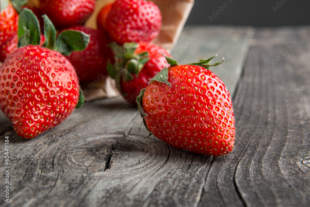 Strawberries on wooden table