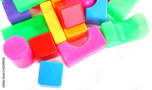 Colorful plastic toys isolated on white