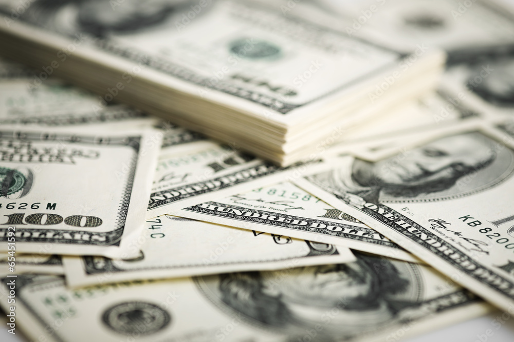 Stack of one hundred dollar bills close-up. Stack of one hundred dollar bills close-up.