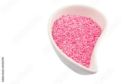 Pink sago pearls in a ceramic container