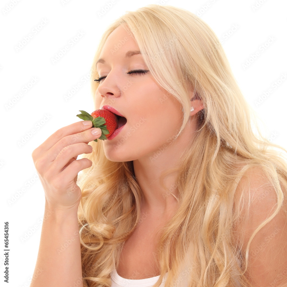 woman eats strawberry woman eats strawberry