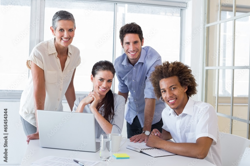 Business people smiling to camera