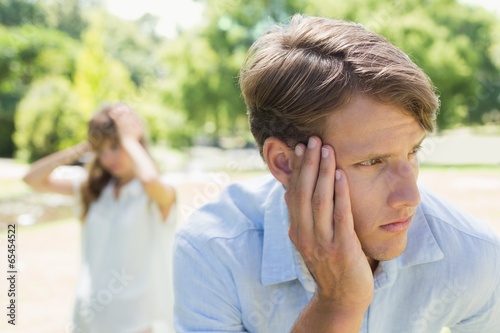 Upset man thinking after a fight with his girlfriend in the park © WavebreakmediaMicro