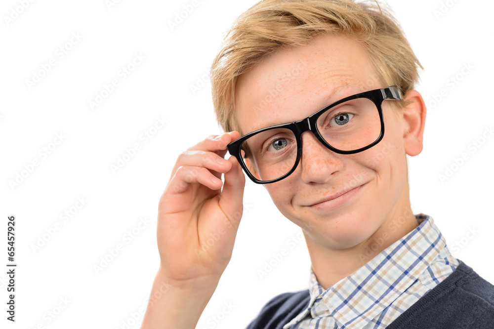 Confident nerd boy holding geek glasses