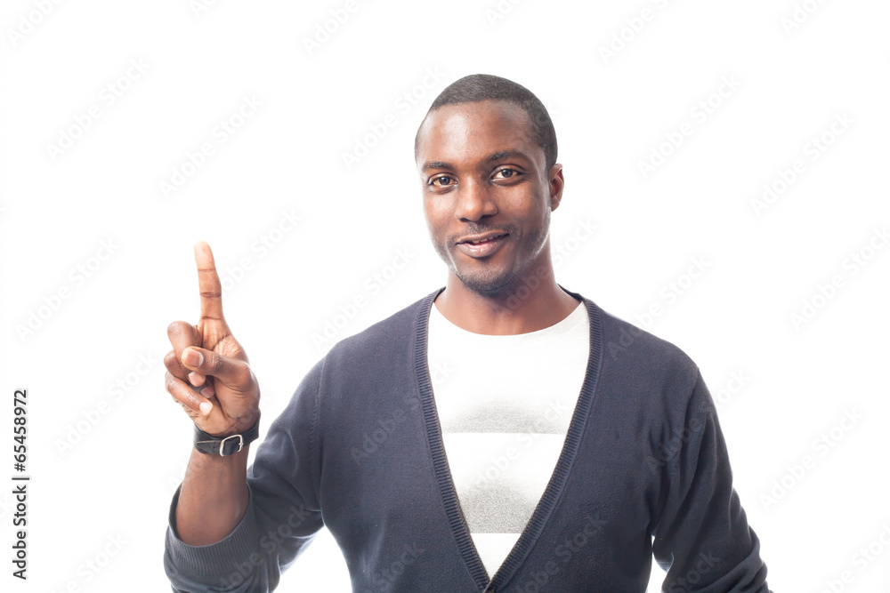 Smiling black man gesturing with finger. Isolated on white. Smiling black man gesturing with finger. Isolated on white.