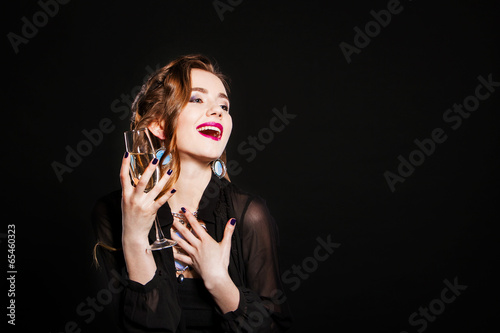 stylish young women with glasses of champagne