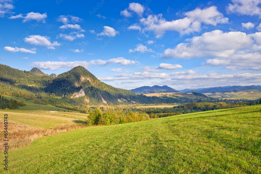 The Pieniny Mountains landscape, Carpathians. Clouds on blue sky