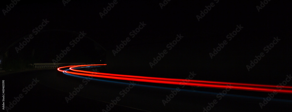 Car light trails in the tunnel. - obrazy, fototapety, plakaty 