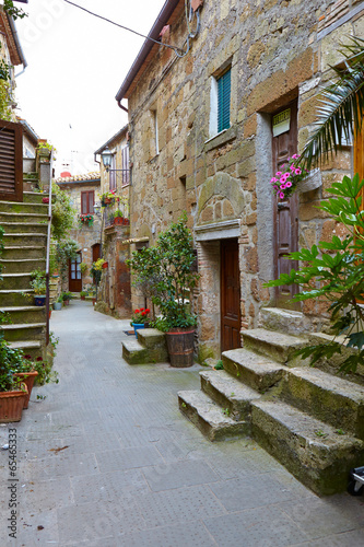 Narrow Alley With Old Buildings In Italian City