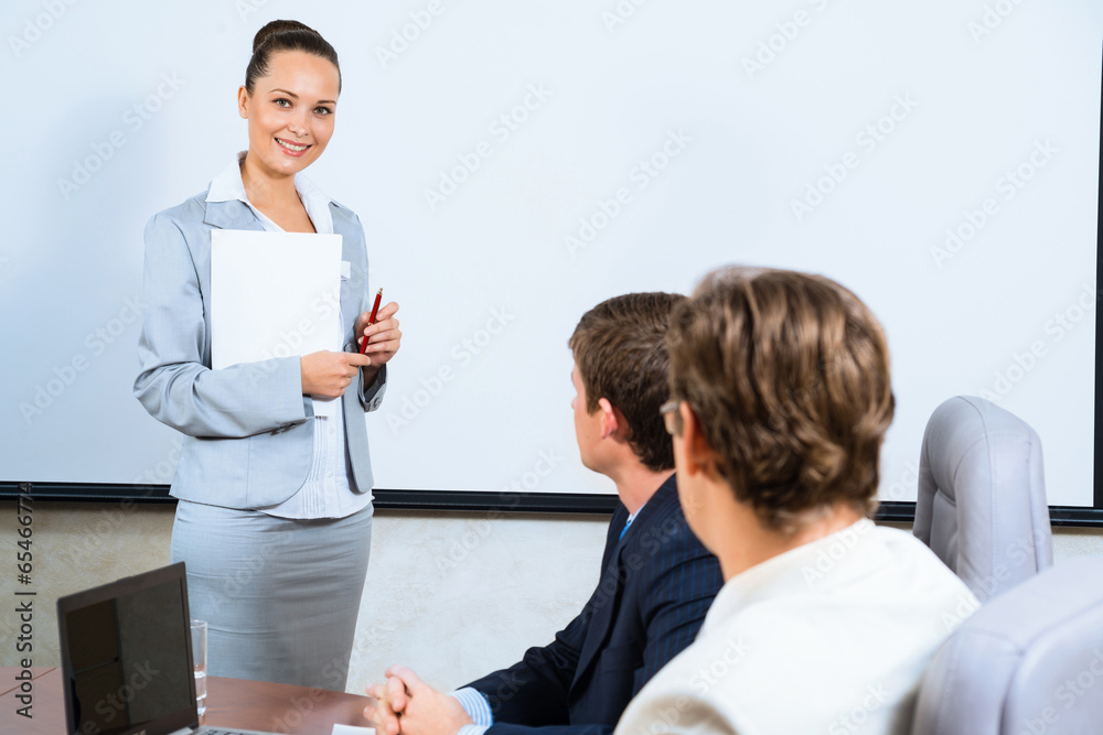 discusses business woman with colleagues discusses business woman with colleagues