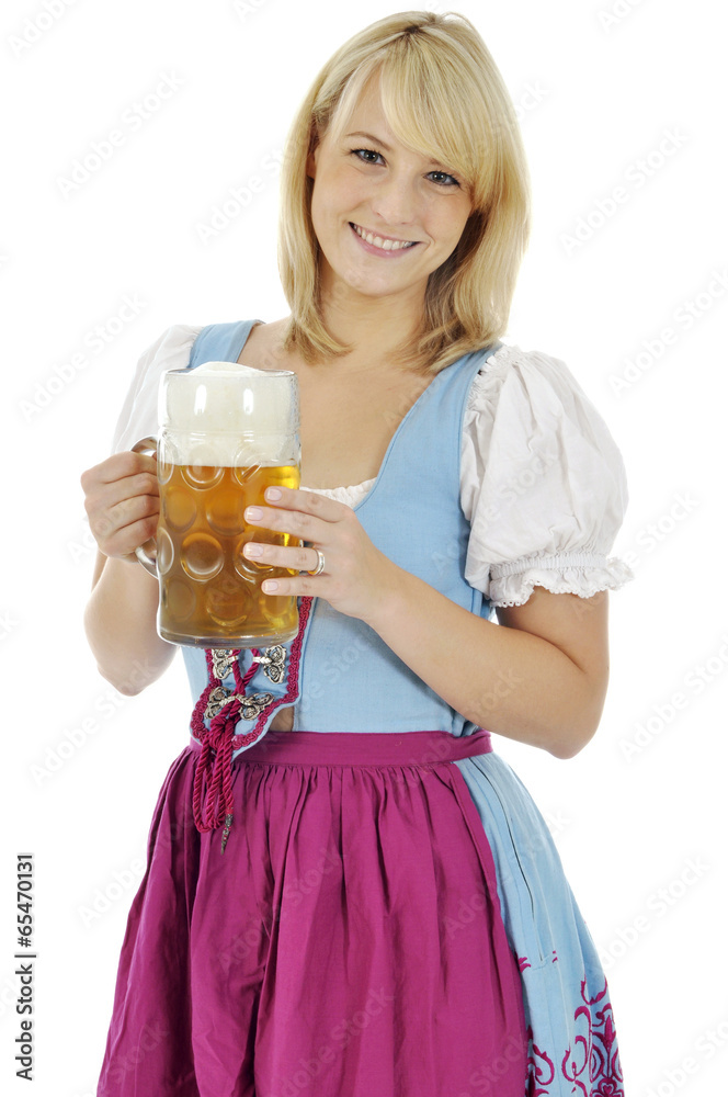 Frau im Dirndl mit Maßkrug Bier Frau im Dirndl mit Maßkrug Bier