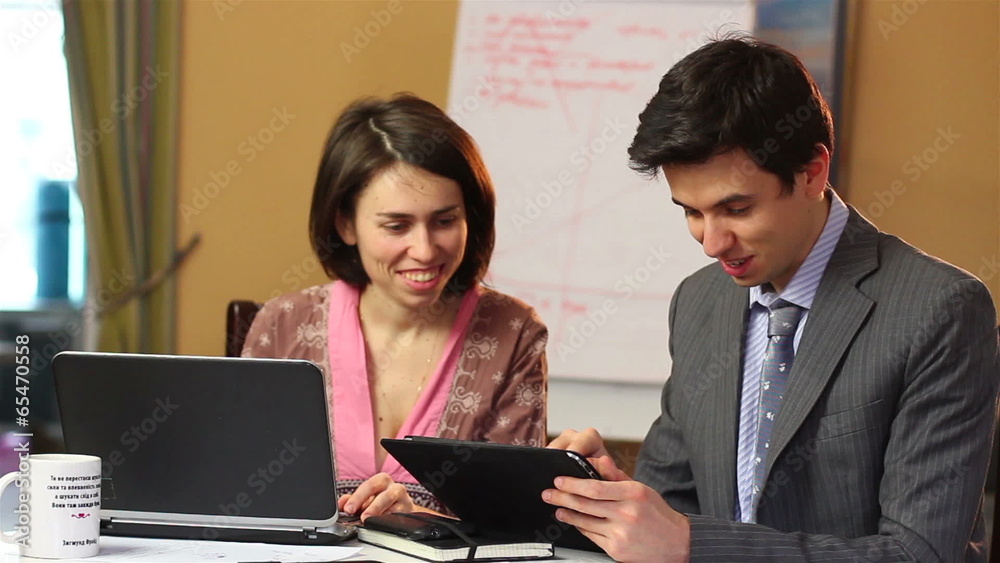 Business man woman smiling on work meeting in office discussion Business man woman smiling on work meeting in office discussion