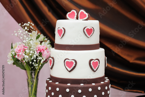 Delicious white and brown wedding cake