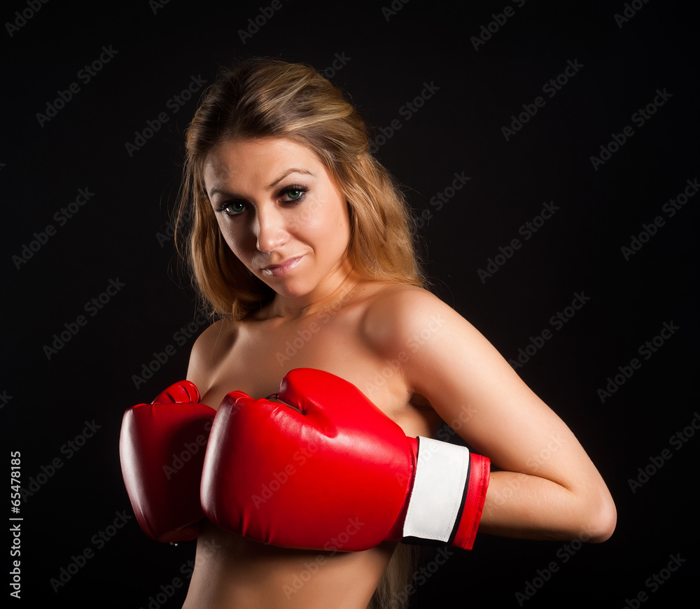 beautiful nude girl with boxing gloves