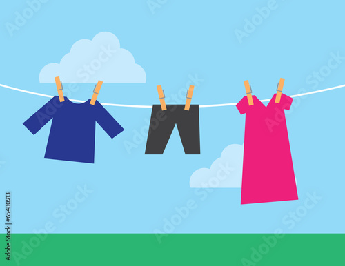 A few clothes hanging from a clothesline