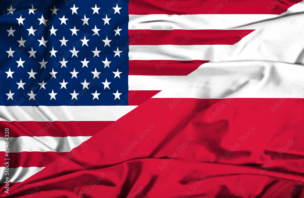 Obraz premium Macha flagą Polski i USA