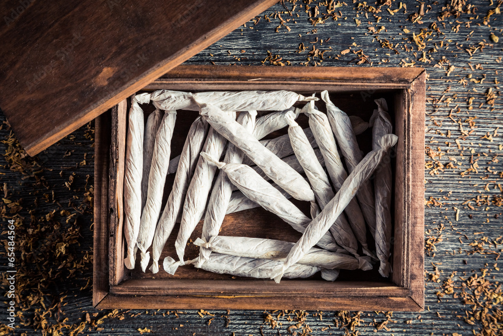 Old wooden box with cigarettes
