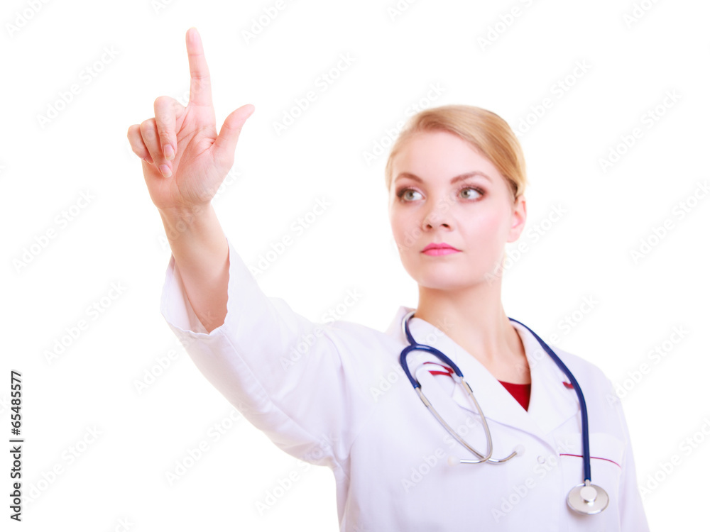 Woman doctor or nurse in lab coat pointing blank copy space Woman doctor or nurse in lab coat pointing blank copy space