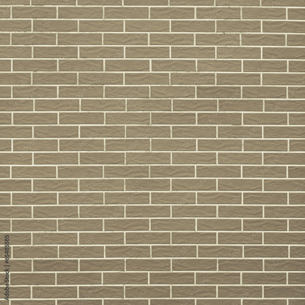 Fototapeta premium Closeup of brownish green brick wall as background or texture