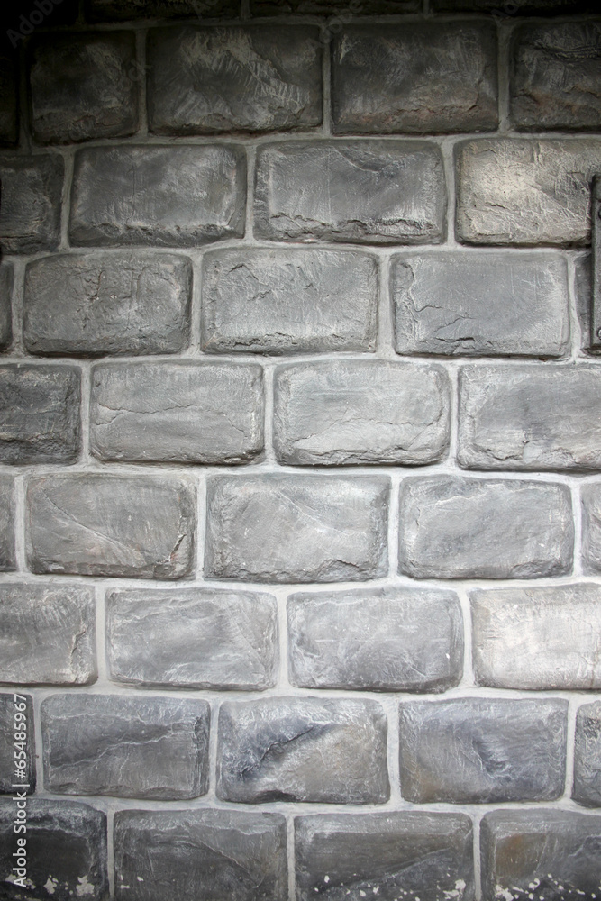 Fototapeta premium Old stone of dark wall.