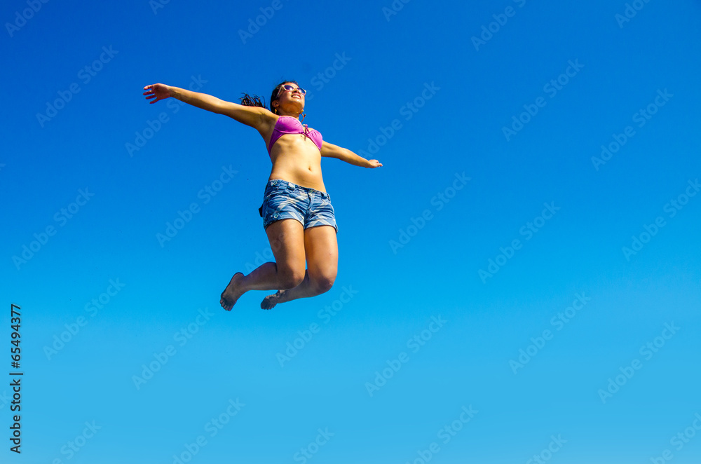 Girl is jumping in the air