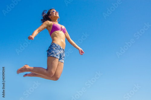 Girl is jumping in the air