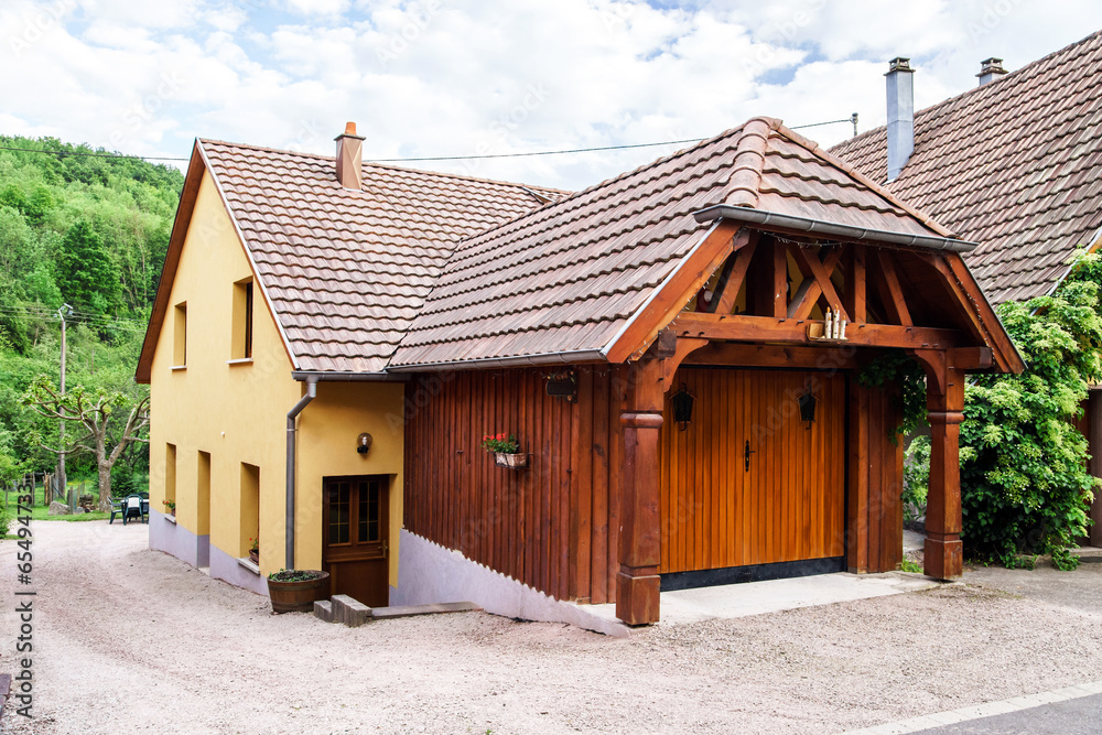 Wooden garage builded near village house