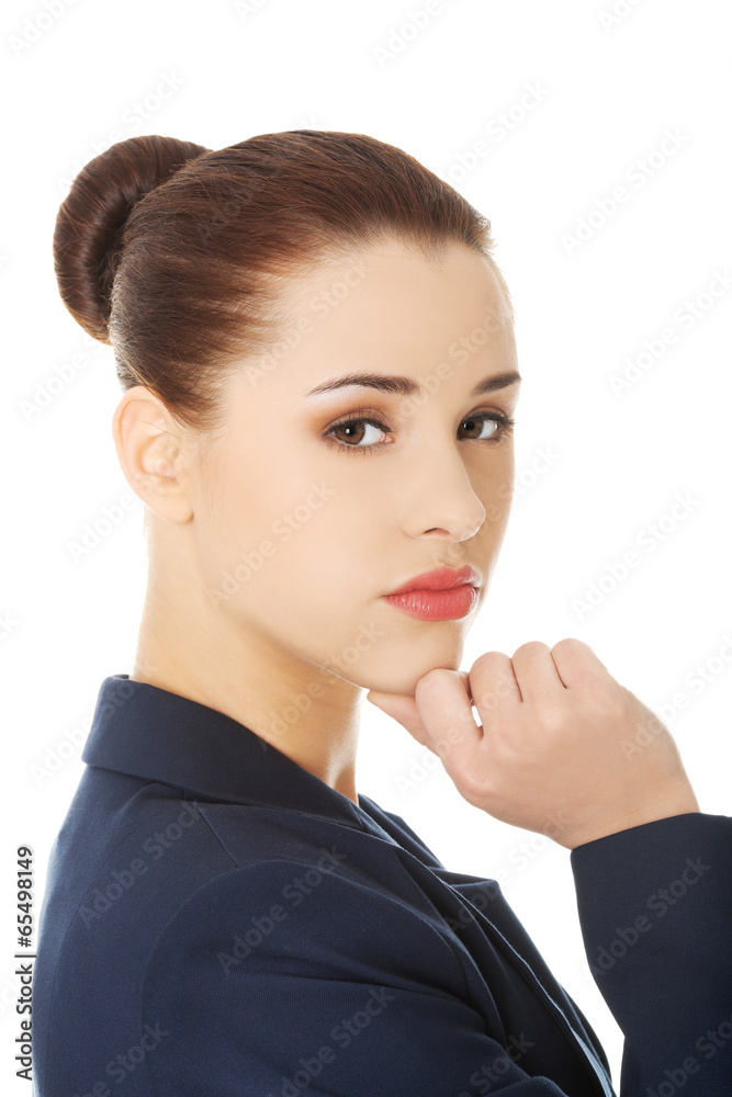Business woman pointing on copy space.