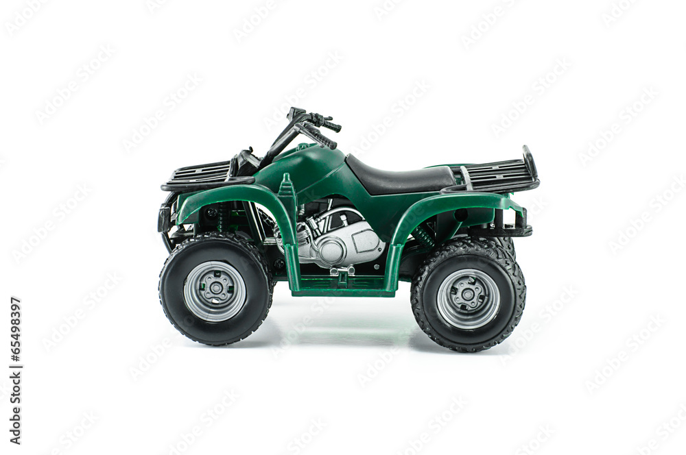 Green ATV toy isolated on white