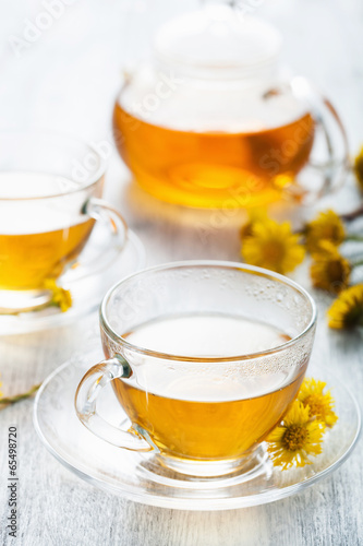 herbal tea with coltsfoot flowers