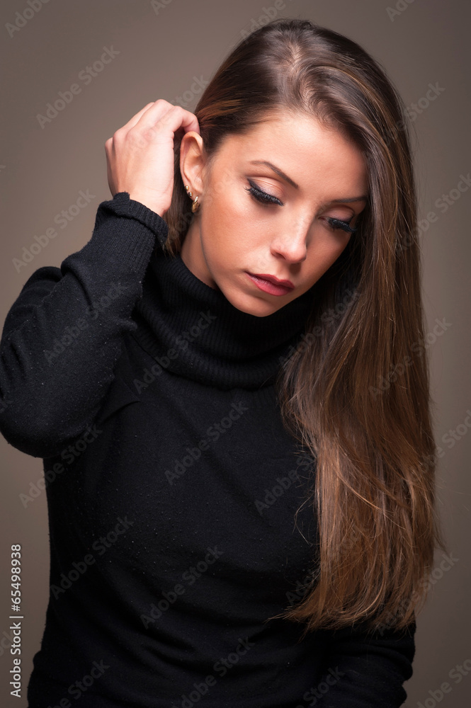 Intimate portrait of woman on dark background. Intimate portrait of woman on dark background.