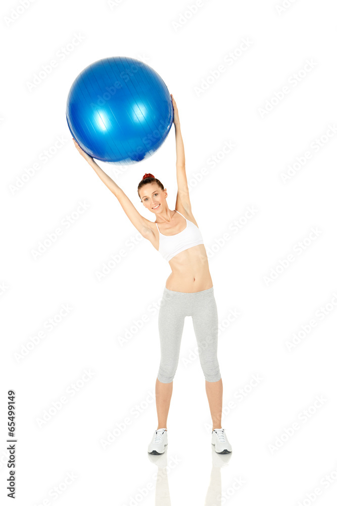 Fitness girl working with pilates ball Fitness girl working with pilates ball
