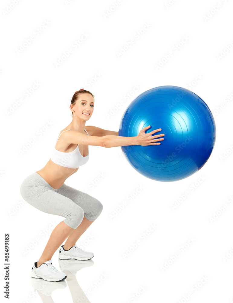 Fitness girl working with pilates ball Fitness girl working with pilates ball