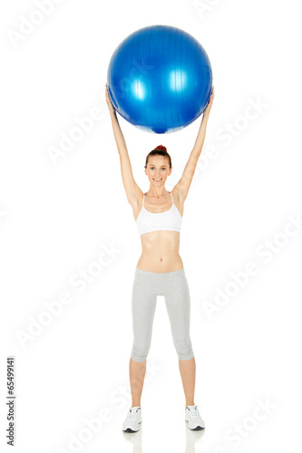 Fitness girl working with pilates ball © clownbusiness