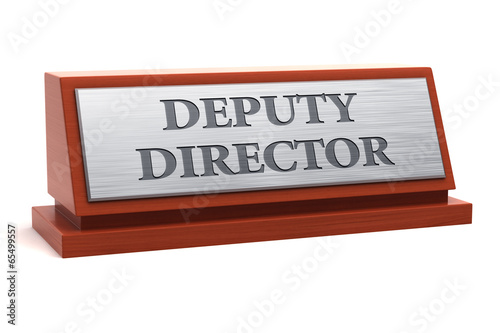 Tapeta Deputy Director job title on nameplate