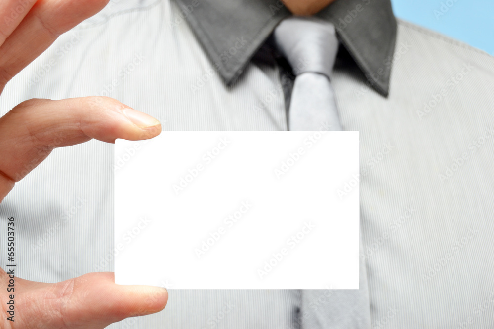 Man with a white card in hand Man with a white card in hand